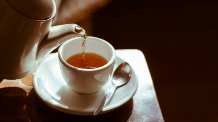 pouring tea in a cup