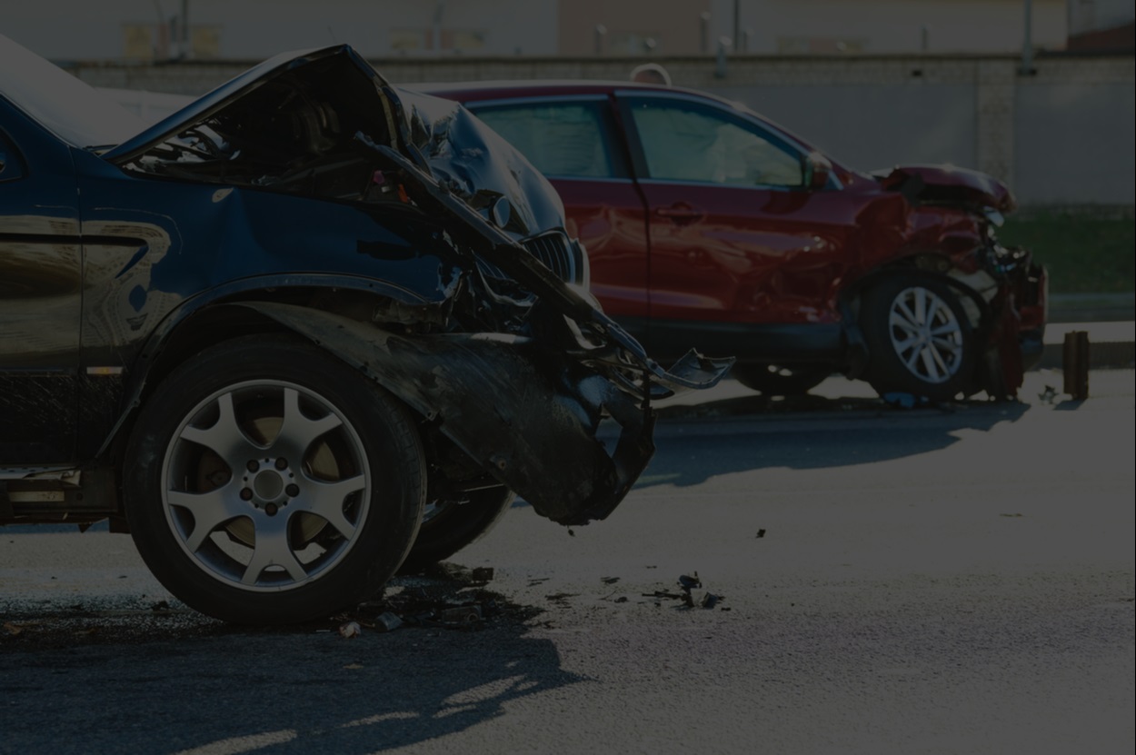 Two Cars Wrecked In The Road