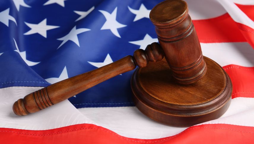 judge gavel on national American flag