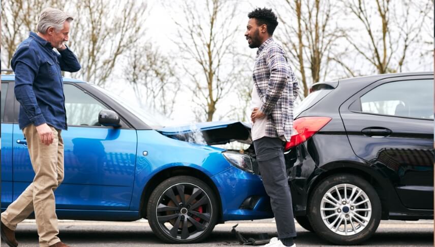 two men discussing car accident